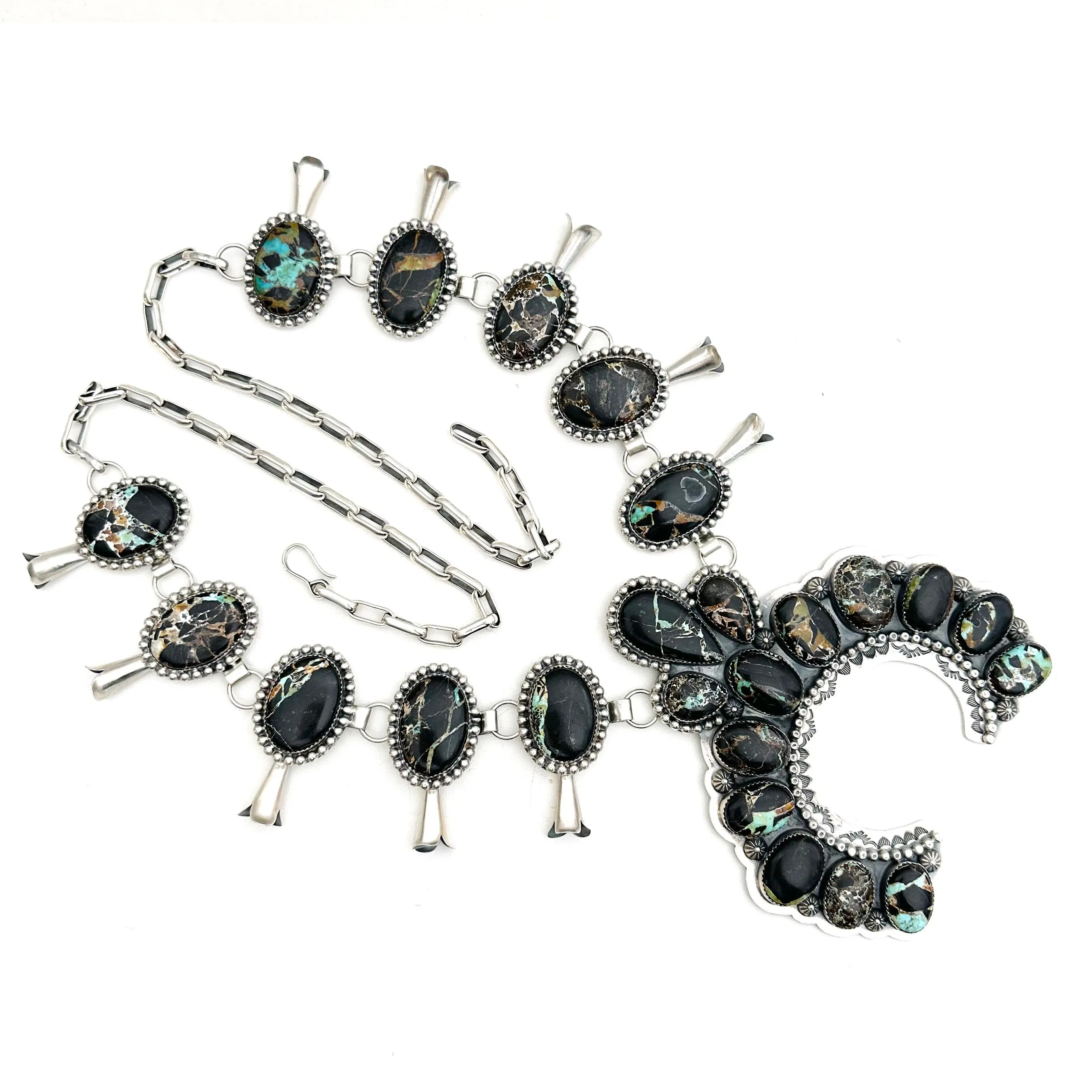 Oversized Black Jack Turquoise Squashblossom by Delbert Secatero